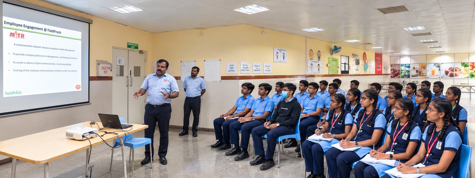 A company representative briefing MMS Commerce students during the industrial visit programme