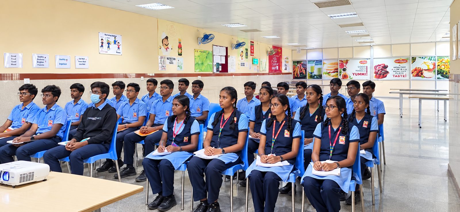 MMS Commerce students listening during the industrial visit programme