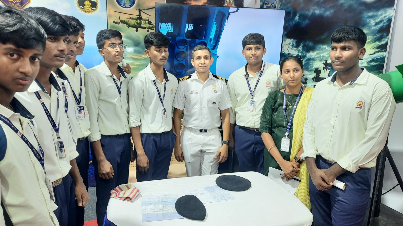 MMS students at the Indian Navy exhibit with a naval officer