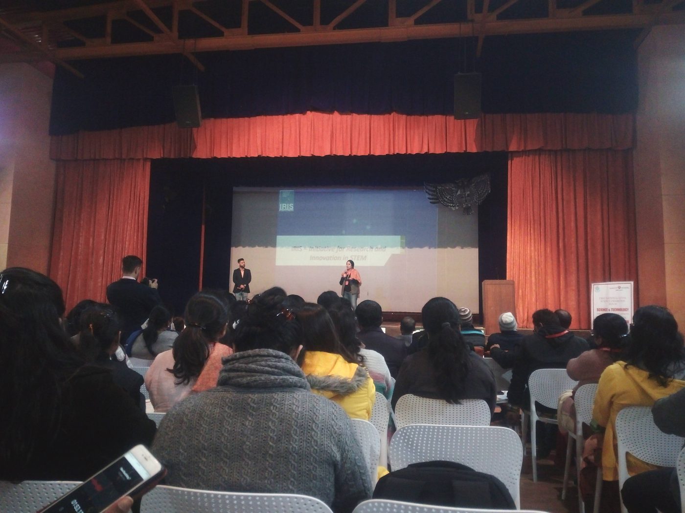 MMS presenting on stage at the IRIS national finals in New Delhi