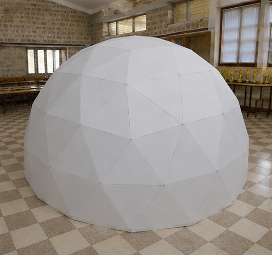 The completed Version 1 planetarium dome, a compact 10-seat geodesic dome