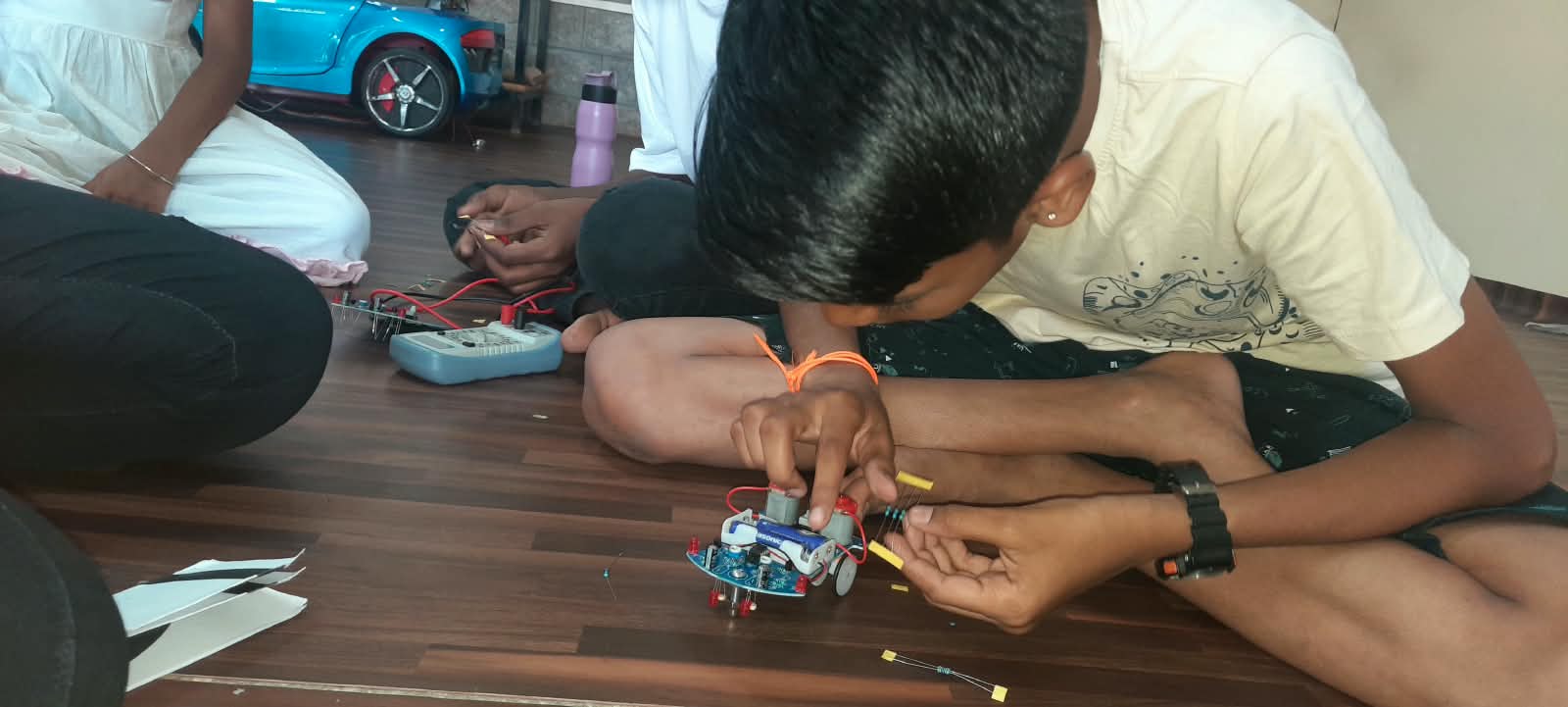 Student testing the assembled robot