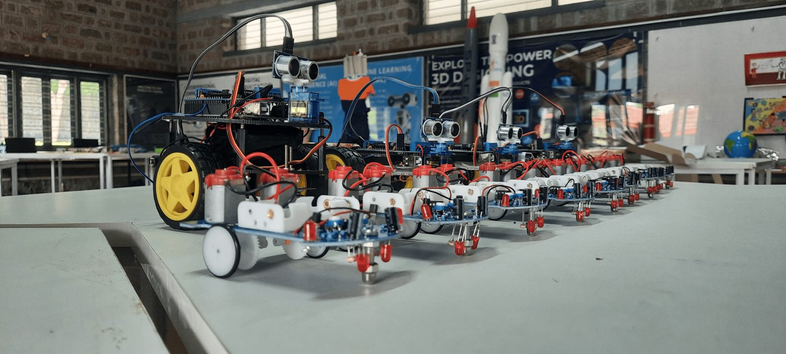 The finished robots lined up on a table