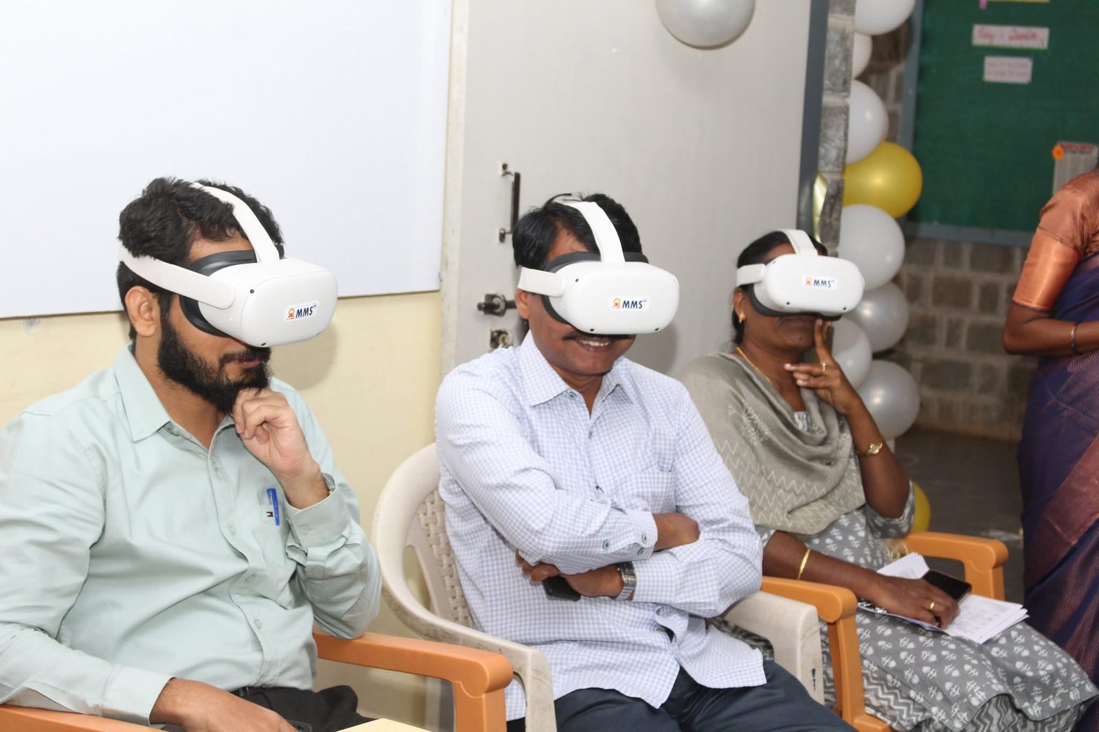 MMS staff trying the VR headsets together